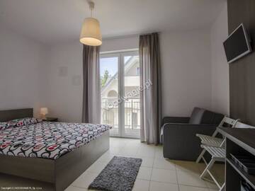 Фото номера Трехместный номер с балконом Проживание в семье Villa Cicha г. Карвия 8