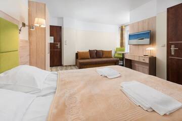 Фото номера Трехместный номер Отель Hotel Willa Złota г. Карвия 2